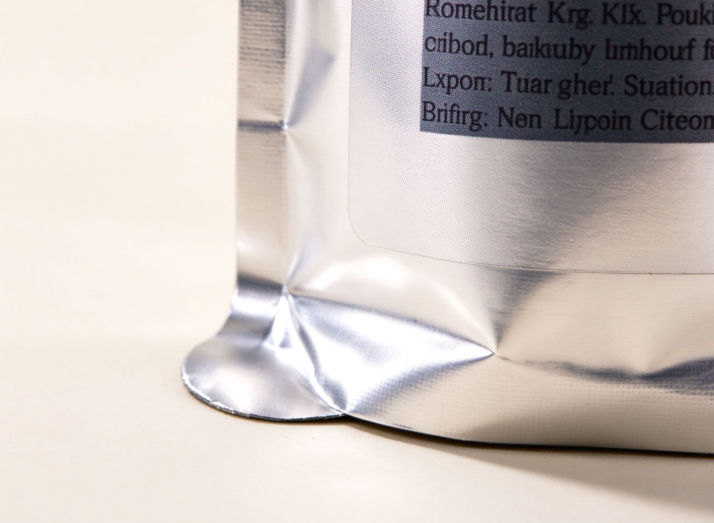 Silver metalized film label on a stand-up pouch